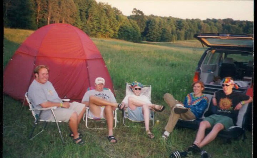 Kam Culbertson sits with friends during Blissfest in the late-1990s. Culbertson said that was one of his first experiences at the festival and he has attended ever since.
