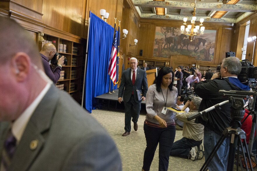 Pence leaves a press conference at the Indiana State Library in Indianapolis in 2015, where he spoke about the state's controversial Religious Freedom Restoration Act.