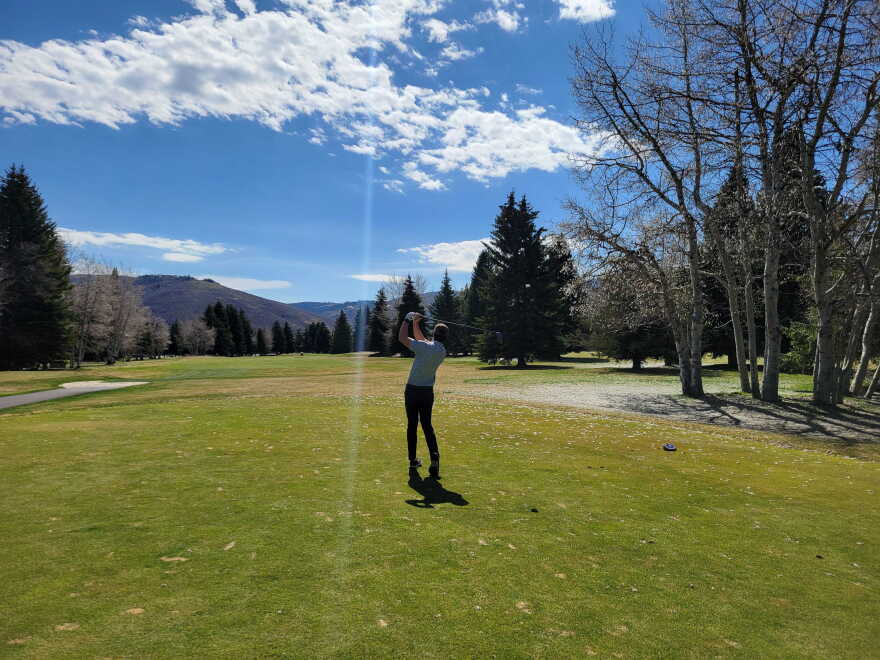 Person golfs at the Park City golf course on March 28, 2026.