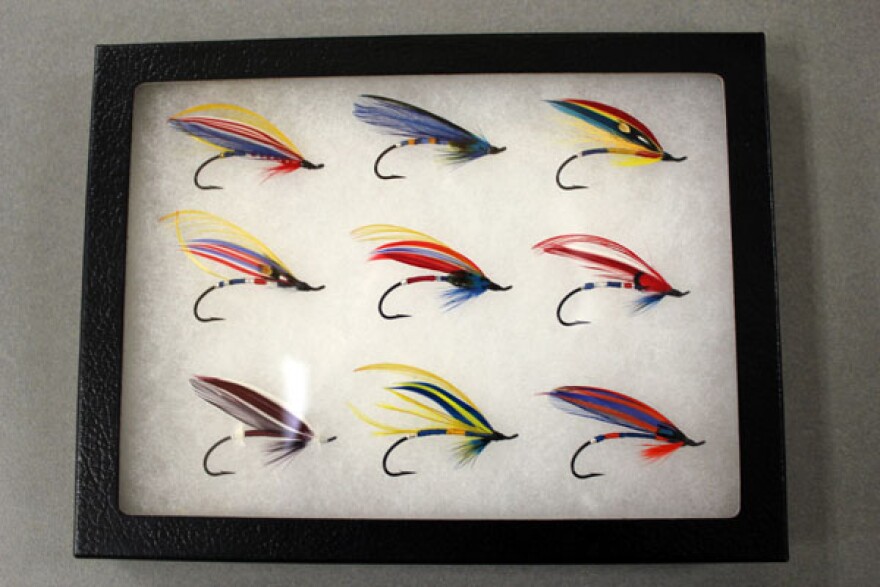 These flies are modeled after different service ribbons and medals earned by soldiers. Flies tied by Monty Williams. Photo by Josh Edge, APRN - Anchorage