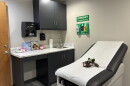 Exam room with stuffed animals and children's books