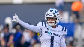 Utah State cornerback Noah Avenger (1) gives a thumbs up to the sideline during an NCAA college football game against UTEP, Saturday, Aug. 30, 2025, in Logan, Utah.
