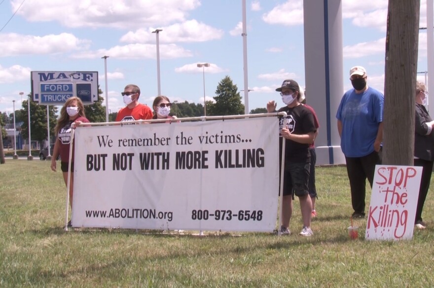 Protesters gathering at the corner of West Springhill Road and U.S. 41 in Terre Haute in July 2020.