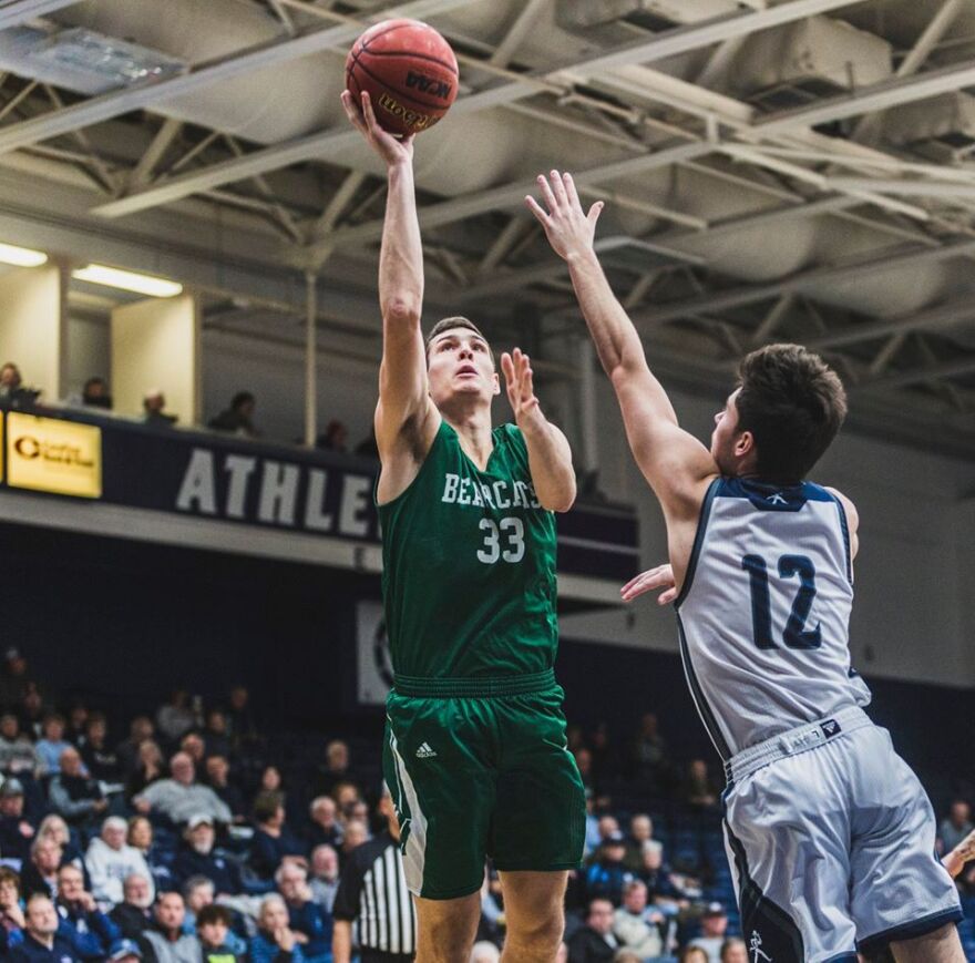 Action shot of Diego Bernard vs Pittsburg State basketball