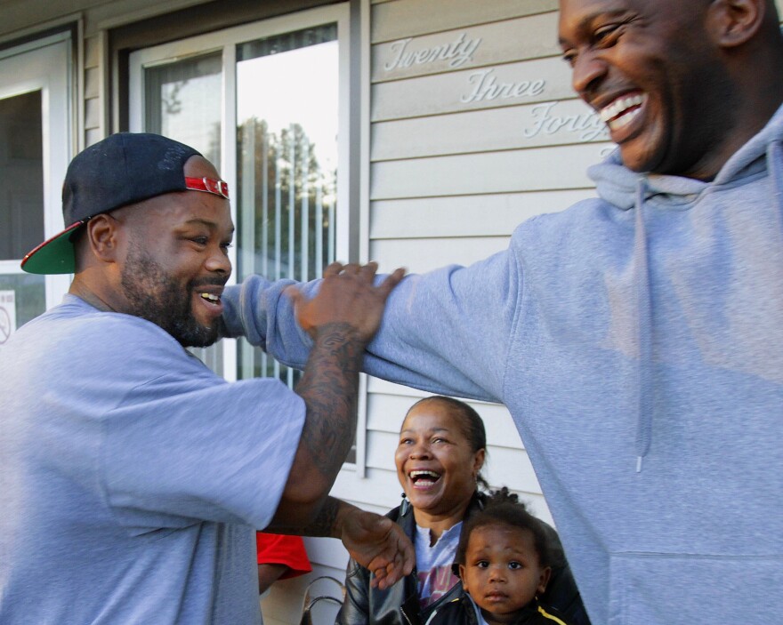 The new guidelines are part of the Obama administration's effort to address long mandatory minimum sentences. Antwain Black (left) was released early after sentencing laws were first eased in 2010.