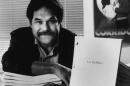 Luis Valdez, who 20 years ago began a Chicano theater company that performed on a truck for farm workers, is emerging as an innovative playwright for a broad audience, and is picture in his office in Los Angeles, March 13, 1986. The author of "Zoot Suit" poses with a copy of his new screenplay "La Bamba!" based on the life of rock musician Ritchie Valens. (Mark Terrill/AP)