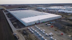 An aerial view during construction in spring 2025 of New Normal 2, or NN2, a 1.1 million-square-foot building erected on the site of the decommissioned test track just east of the original plant in Normal.