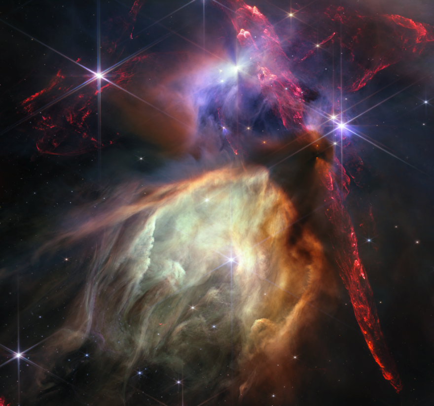 The first anniversary image from NASA’s James Webb Space Telescope displays star birth like it’s never been seen before, full of detailed, impressionistic texture. The subject is the Rho Ophiuchi cloud complex, the closest star-forming region to Earth. It is a relatively small, quiet stellar nursery, but you’d never know it from Webb’s chaotic close-up. Jets bursting from young stars crisscross the image, impacting the surrounding interstellar gas and lighting up molecular hydrogen, shown in red. Some stars display the telltale shadow of a circumstellar disk, the makings of future planetary systems.