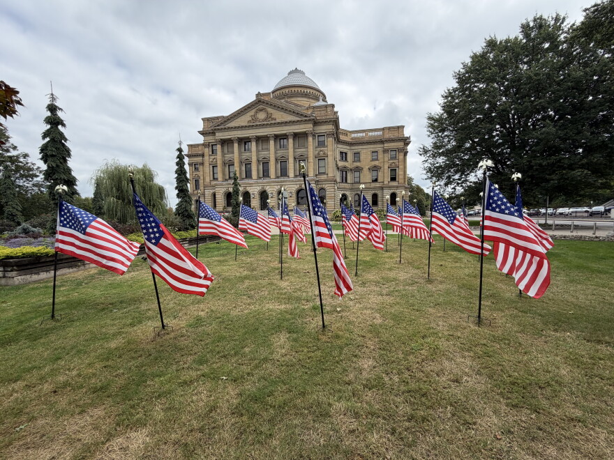Luzerne County’s patriotic display of flags for America 250 and the county’s 240th anniversary is seen Friday, Aug. 28, outside the courthouse in Wilkes-Barre. County officials say a number of U.S. flags and the county flag were stolen from the display earlier in August.
