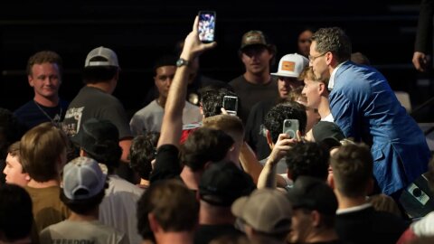 James Fishback, insurgent Republican candidate for Florida governor, poses with young male supporters at Florida Atlantic University in Boca Raton on Sunday, April 19, 2026.