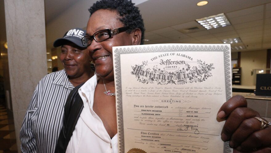 Olanda Smith, left, and Dinah McCaryer were the first to marry in Jefferson county on Monday, Feb. 9, 2015, after a federal judge overturned the state's ban on gay marriage. Several other counties refused to issue marriage licenses that day.