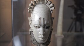 Carved Ivory mask-shaped hip pendant, inlaid with bronze Benin, Queen Idia, Artisit Unknown (16th century) – British Museum, London.