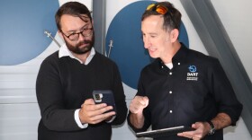 Astronomers Teddy Kareta and Nick Moskovitz at Lowell Observatory look at the images of Dimorphos in the moments after the asteroid was impacted by the DART spacecraft.