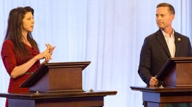 Democrat Betsy Dirksen Londrigan and U.S. Rep. Rodney Davis, a Taylorville Republican, at Thursday's debate in the WILL-TV studios on the University of Illinois campus in Urbana. 