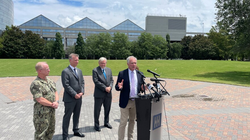 Sen. Tim Kaine outside HII in Newport News, with Adml. Daryl Caudle, Navy Undersecretary Erik Ravens and Australian Ambassador Kevin Rudd. July 14, 2023. Photo by Steve Walsh