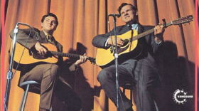 Doc Watson on stage 