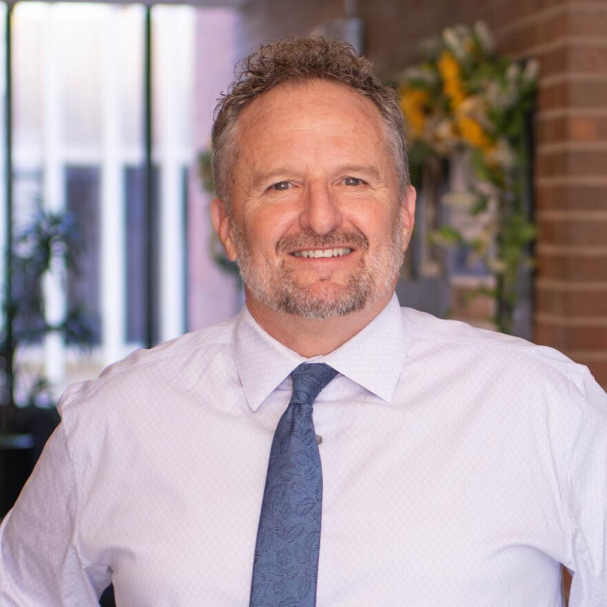 Pima County Superintendent of Schools Dustin Williams smiles inside his office in downtown Tucson on Aug. 3, 2026.