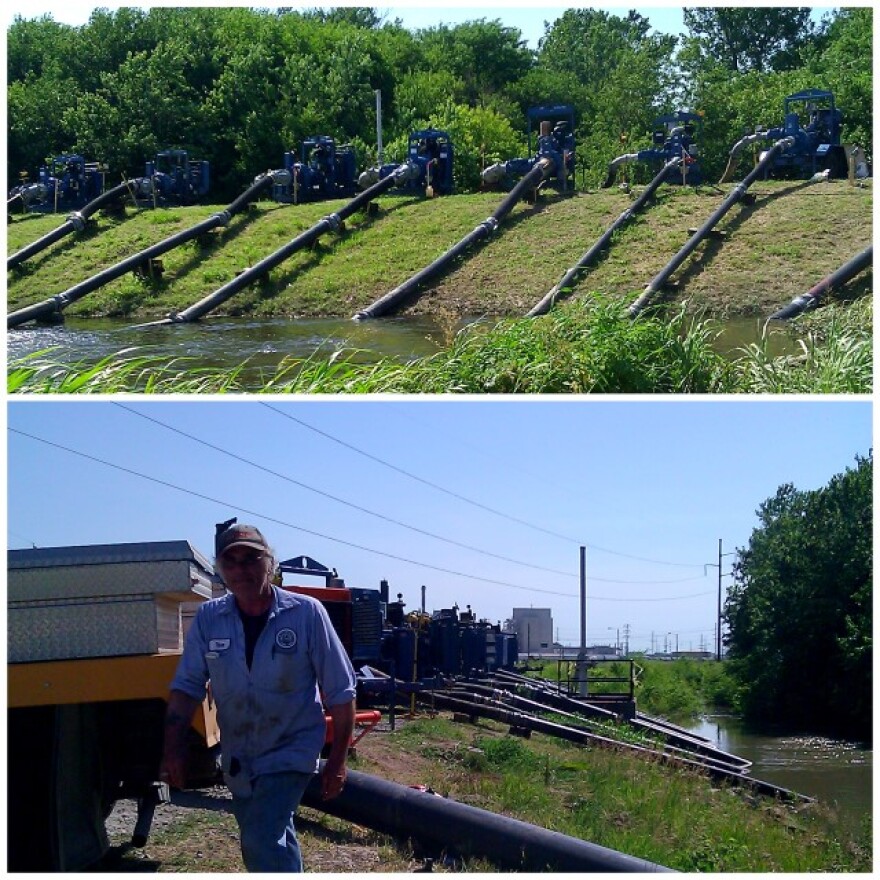 At St.Joseph, MO., water is pumped up one side of the southside levee, down into the Missouri river on the other. (click to enlarge)