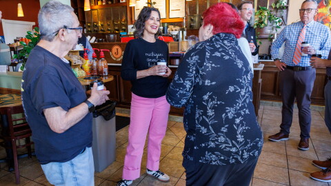 Gov. Gretchen Whitmer greets customers at a coffee shop in Jackson, Mich., on Oct. 29, 2026.