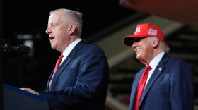 President Donald Trump listens as North Carolina Republican U.S. Senate candidate Michael Whatley speaks during a rally at Gastonia Municipal Airport, Wednesday, Sept. 16, 2026, in Gastonia, N.C.