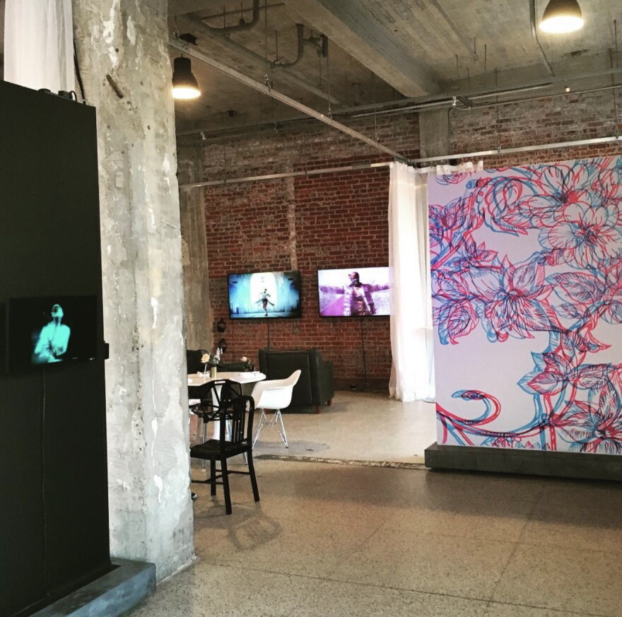 Artwork and video displays on view during the "Ghost in the Machine" exhibition, curated by Charles Rasputin at Work|Release. The gallery featured rotating installations.