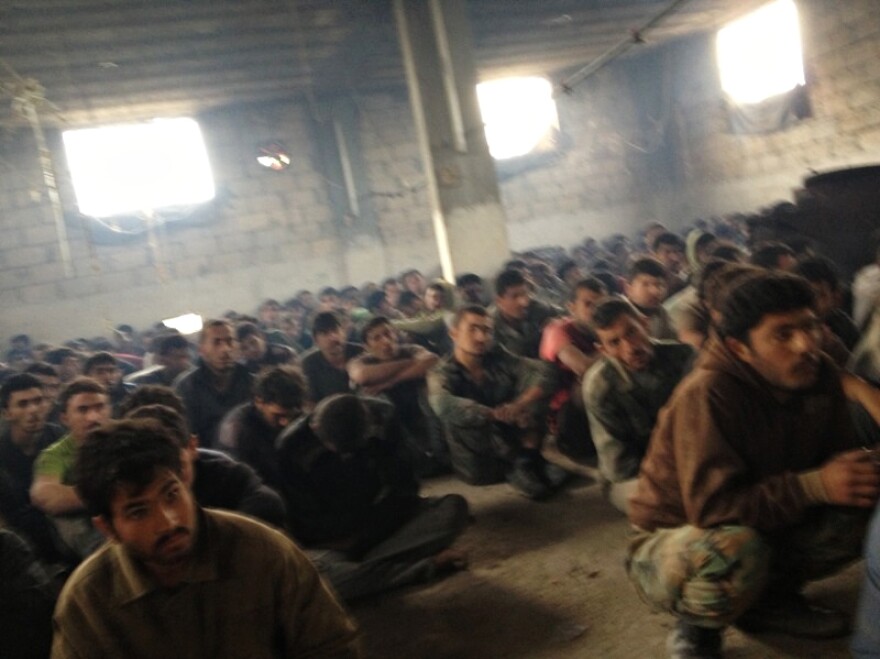 Here are some of the nearly 300 Syrian soldiers being held as prisoners in Khirbet al-Joz. Activists say they saw no sign of torture or abuse directed against the captives, who include Alawites, Christians and Shiite Muslims, all minority communities in Syria.