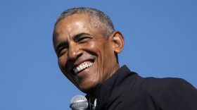 Former President Barack Obama speaks during a drive-in campaign rally for Joe Biden on Oct. 31 in Flint, Michigan.