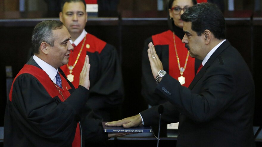 Venezuela's President Nicolas Maduro takes the oath of office in Caracas, Venezuela, on Thursday. Maduro starts his second term amid international denunciation of his victory and a devastating economic crisis.