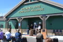 Several fire and government officials stand for a photo after a ribbon cutting at the Wyoming State Forestry Helibase in Casper on Thursday, Sept. 24, 2026.