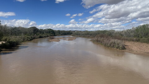 The Rio Grande flows just north of the Central Avenue bridge in Albuquerque on Oct. 13, 2026.