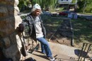 Kenneth Jenkins stands on his front porch along Montgall Avenue where he's been battling neighbors and city code enforcers.