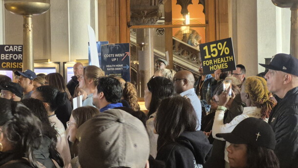 Advocates call for funding increases for the Health Homes program during a rally on Oct. 7, 2026, at the New York State Capitol.