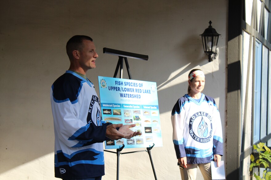 Shane Bowe, left, discusses the various species of the Upper/Lower Red Lake Watershed during the Water Festival on Oct. 10, 2024.