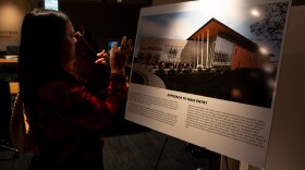 Christa Montgomery, Republican U.S. Rep. Bob Onder’s district officer, makes a photograph of a newly planned regional law enforcement training center at East-West Gateway’s headquarters on Wednesday, Aug. 27, 2025, in downtown St. Louis.