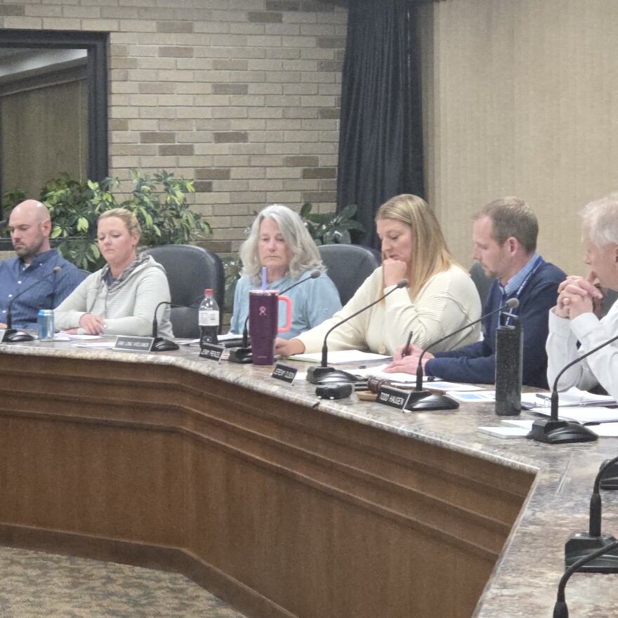 From left, Board members Jack Aakhus, Anna Manecke, Ann Long Voelkner, Jenny Frenzel, Superintendent Jeremy Olson, and Board chair Todd Haugen, during a special meeting on March 2, 2026.