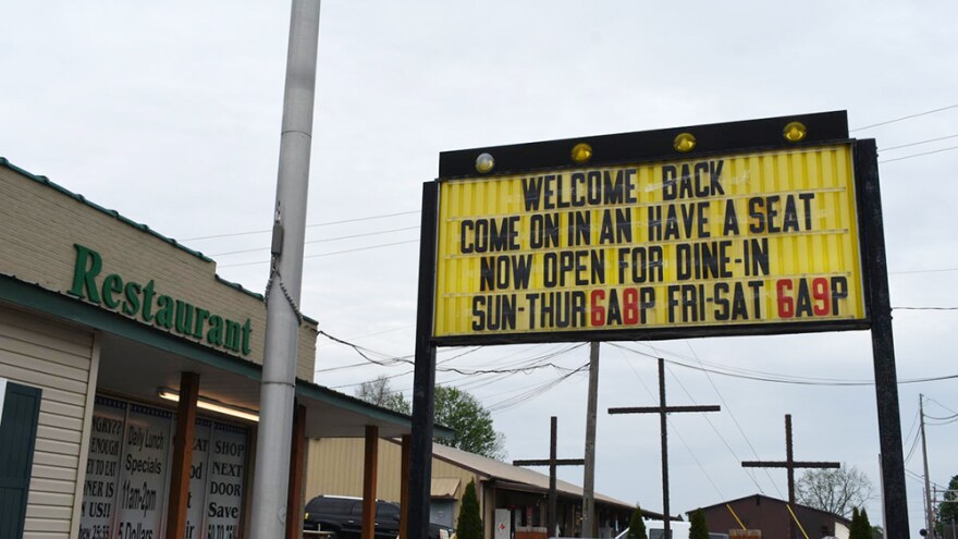 A sign outside the Liberty Bell Restaurant in Liberty, Indiana welcomes customers back after closing briefly in accordance with Indiana's COVID-19 regulations.