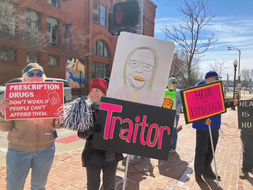 On Monday, March 23, the 16th anniversary of the Affordable Care Act, protestors gathered outside offices of GOP Iowa Congresswoman Mariannette Miller-Meeks (at 2nd and Main, Davenport) to discuss expiration of tax credits that helped people access affordable health insurance.