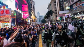 Protesters stand off against riot police in Tsim Sha Tsui district on October 27, 2019 in Hong Kong, China. (Billy H.C. Kwok/Getty Images)