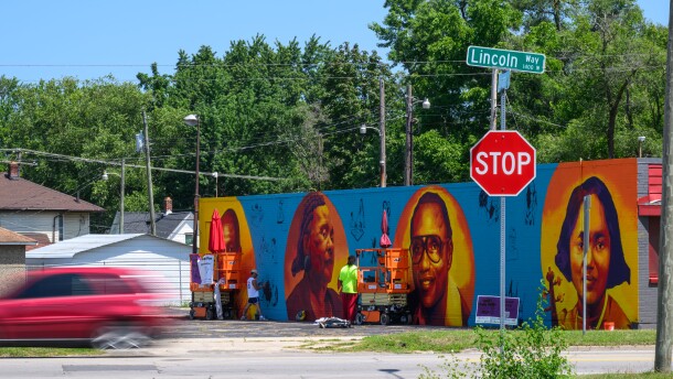 August 3, 2026; Mural artists paint the side of a building on Lincolnway West in South Bend. (Photo by Matt Cashore/University of Notre Dame)