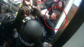 Body-worn camera footage shows Koen at the front of the mob fighting with officers.