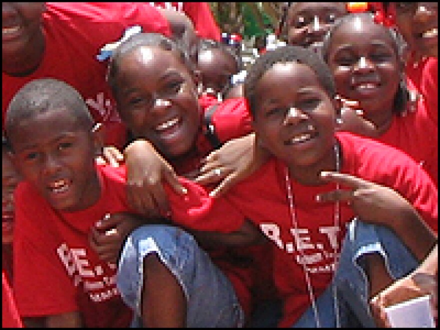 Kids from a housing development in Marrero, located south of New Orleans, take a day-camp trip to the Audubon Zoo. 