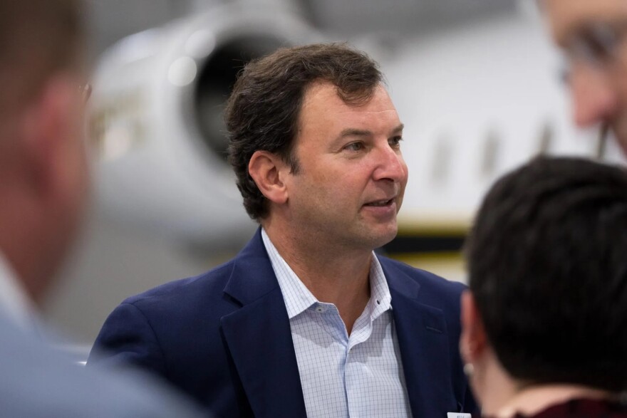 State Rep. Craig Goldman, R-Fort Worth, talks to attendees during AVX Aircraft Co.’s ribbon-cutting event on Oct. 29, 2024, at Perot Field Fort Worth Alliance Airport.