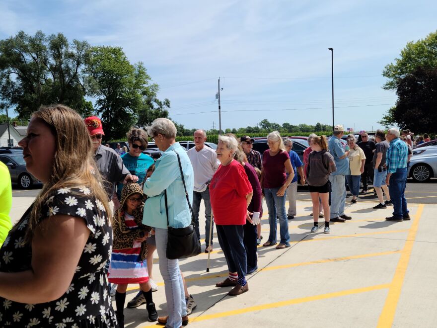 The line at the grand reopening extended well into the parking lot.