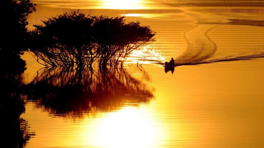 <p>A boat navigates along the Black River near the village of Tumbira, in the Amazon, northern Brazil, on Aug. 18. In a few weeks, Google will post a 3-D, on-the-ground view of Tumbira on Google Earth Outreach. </p>