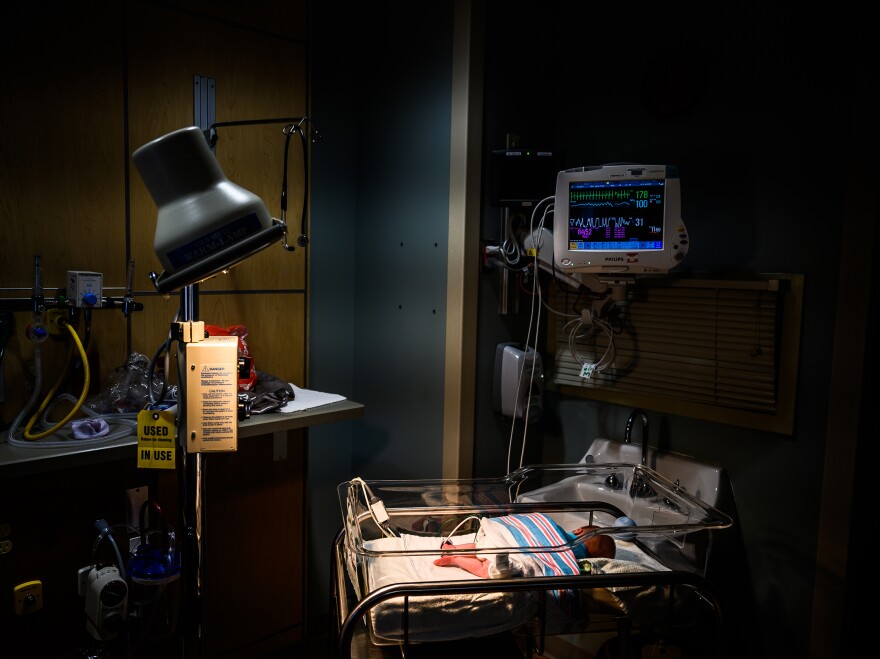 An infant is monitored for opioid withdrawal in a neonatal intensive care unit at the CAMC Women and Children's Hospital in Charleston, W.Va., in June. Infants exposed to opioids in utero often experience symptoms of withdrawal.