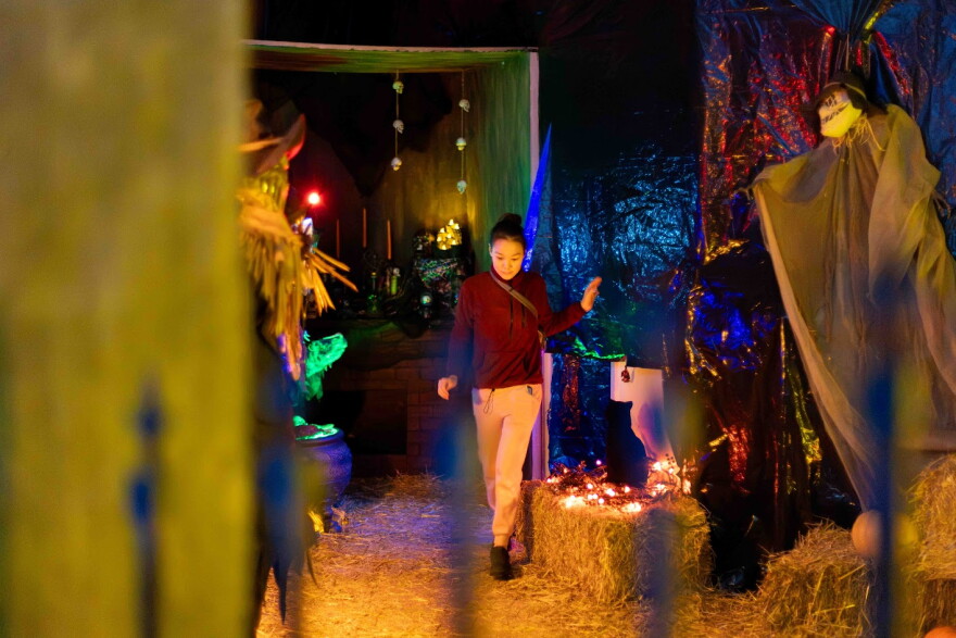 A child walks through the haunted house the Trials of Aangaayuk on Oct. 29. 2026.