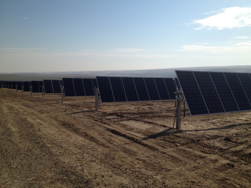 Solar farms like this one near Lind in Adams County have become more common in Washington. A new report says projects like are responsible have, in some cases, caused the shifting of property taxes to individuals and businesses in rural counties.