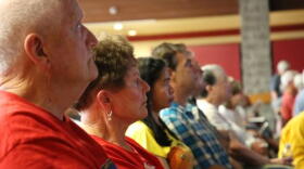 About 400 people turned out to a community meeting with fire managers in Merlin, Oregon, as the Taylor Creek Fire threatened hundreds of homes in July 2018.