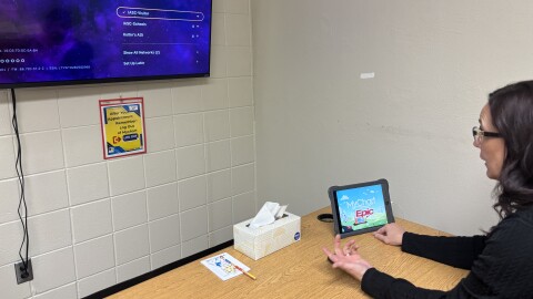 Project Manager Susan Nelson explains the Deer River High School's telehealth setup Dec. 4, 2025.