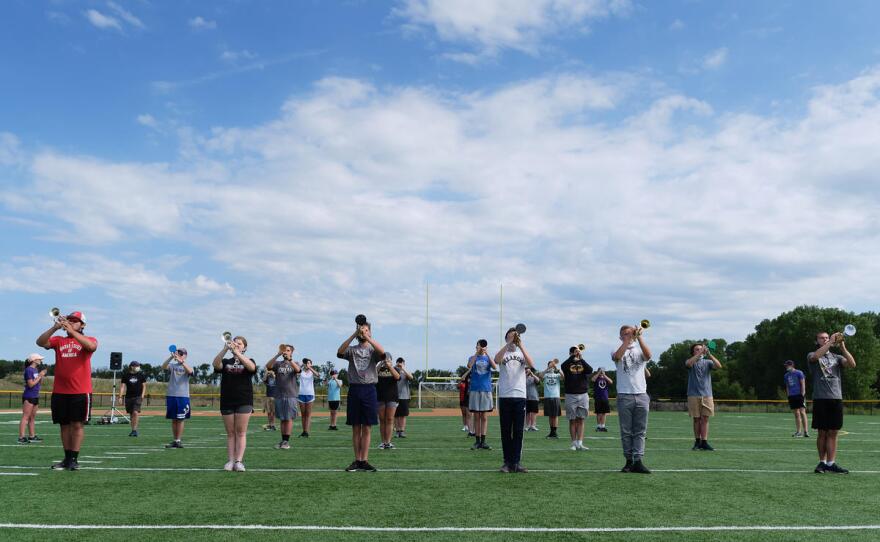 Valley Center High School band members stand at attention during camp. (Photo by Brian Grimmett, Kansas News Service)